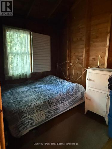 Bedroom 1 - Apl1136E - 19 Cache Lake, South Algonquin, ON - Indoor Photo Showing Bedroom