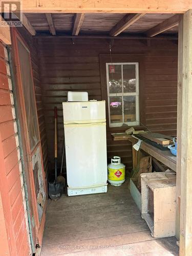 Outdoor kitchen area, propane fridge - Apl1136E - 19 Cache Lake, South Algonquin, ON - Indoor Photo Showing Other Room