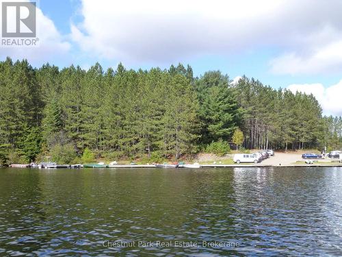 Cache Lk landing: parking, boat launch, garbage - Apl1136E - 19 Cache Lake, South Algonquin, ON - Outdoor With Body Of Water With View
