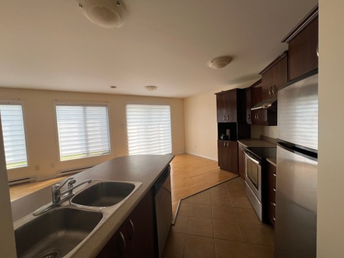 Cuisine - 5-7655 Rue Lautrec, Brossard, QC - Indoor Photo Showing Kitchen With Double Sink