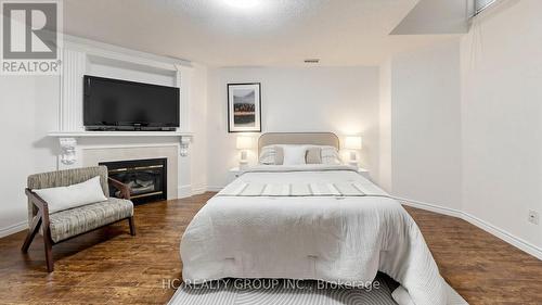 301 - 11 Everson Drive, Toronto, ON - Indoor Photo Showing Bedroom With Fireplace