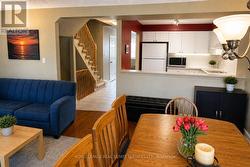 Kitchen open to dining for entertaining - 