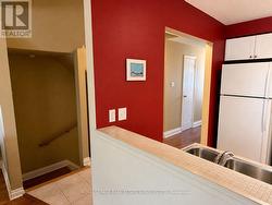 View of kitchen and entrance to basement - 