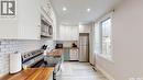 1232 2Nd Avenue N, Saskatoon, SK  - Indoor Photo Showing Kitchen With Stainless Steel Kitchen With Double Sink 