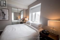 Bedroom with Door and Window - 