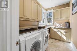 Convenient Main Level Laundry Room - 