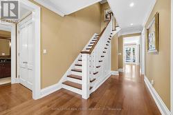 Hardwood Staircase Leading to the Upper Level - 