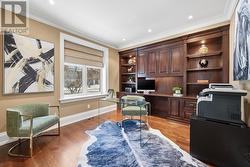 Main Floor Office with Custom Built-In Cabinetry - 