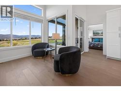 Cozy living space with gas fireplace and golf course views! - 
