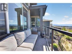 Main floor covered deck with golf and lake view - 