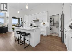 Kitchen with access to laundry and garage - 