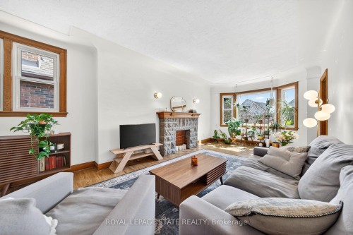 188 Wexford Avenue S, Hamilton, ON - Indoor Photo Showing Living Room With Fireplace
