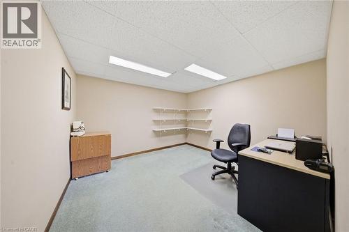 Recessed ceiling with acoustic tiles and integrated fluorescent lighting - 200 Morrison Drive, Caledonia, ON - Indoor Photo Showing Other Room