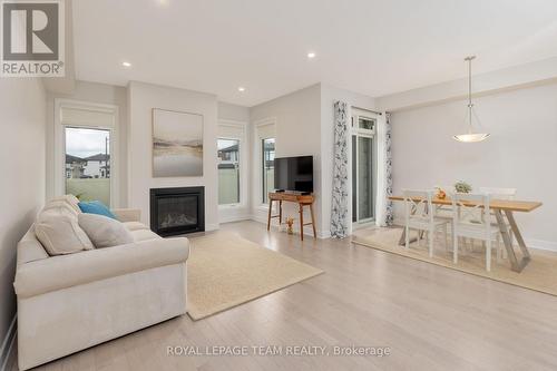 506 Cobra Crescent, Ottawa, ON - Indoor Photo Showing Living Room With Fireplace