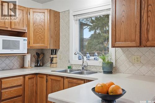 174 Rao Crescent, Saskatoon, SK - Indoor Photo Showing Kitchen With Double Sink