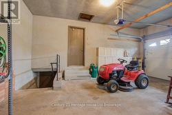 DOUBLE ATTACHED GARAGE HAS WALKUP FROM BASEMENT - 