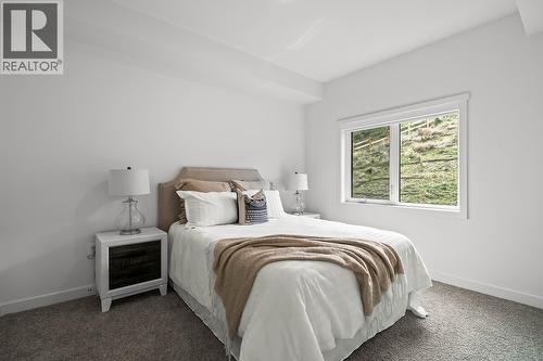 Second Bedroom. Photos may be of a similar home in the community. - 1111 Frost Road Unit# 202, Kelowna, BC - Indoor Photo Showing Bedroom