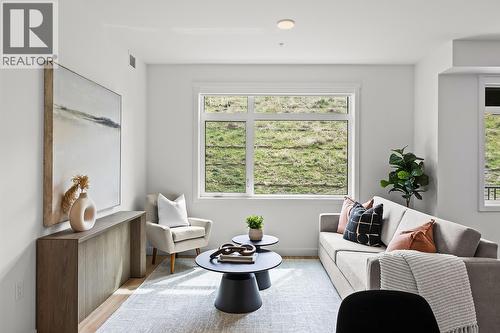 Living Room. Photos may be of a similar home in the community. - 1111 Frost Road Unit# 202, Kelowna, BC - Indoor Photo Showing Other Room