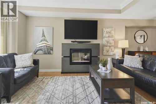 227 Brightwater Way, Saskatoon, SK - Indoor Photo Showing Living Room With Fireplace