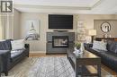 227 Brightwater Way, Saskatoon, SK  - Indoor Photo Showing Living Room With Fireplace 