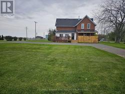 New back porch covered with crank basement access - 