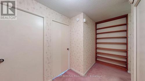 Hallway with B/I Shelves - 1011 - 80 Inverlochy Boulevard, Markham, ON - Indoor Photo Showing Other Room