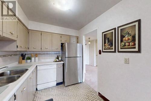 Virtually Staged - 1011 - 80 Inverlochy Boulevard, Markham, ON - Indoor Photo Showing Kitchen With Double Sink