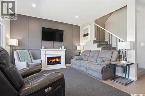 331 Underhill Bend, Saskatoon, SK - Indoor Photo Showing Living Room With Fireplace