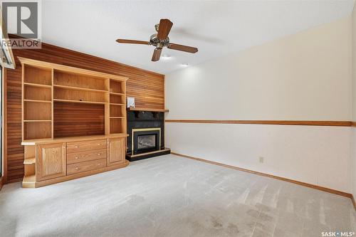 3 425 Pinehouse Drive, Saskatoon, SK - Indoor Photo Showing Other Room With Fireplace