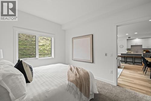Second Bedroom. Photos may be of a similar home in the community. - 1057 Frost Road Unit# 418, Kelowna, BC - Indoor Photo Showing Bedroom