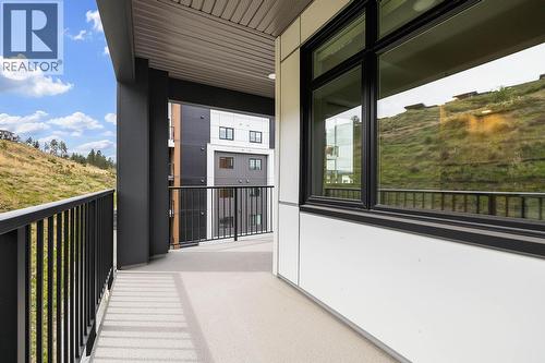 Patio. Photos may be of a similar home in the community. - 1057 Frost Road Unit# 418, Kelowna, BC - Outdoor With Balcony With Exterior