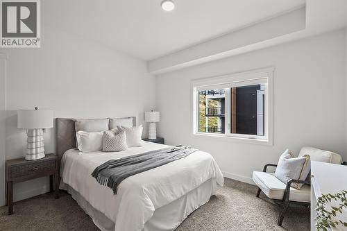 Primary Bedroom. Photos may be of a similar home in the community. - 1057 Frost Road Unit# 418, Kelowna, BC - Indoor Photo Showing Bedroom