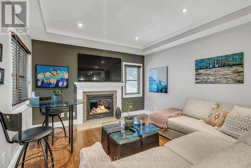 1 Old Sunset Boulevard, Ottawa, ON - Indoor Photo Showing Living Room With Fireplace