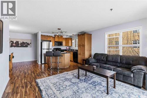 A210 103 Wellman Crescent, Saskatoon, SK - Indoor Photo Showing Living Room