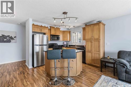 A210 103 Wellman Crescent, Saskatoon, SK - Indoor Photo Showing Kitchen With Stainless Steel Kitchen