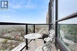 Balcony with glass railing and durable flooring - 