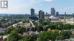 Urban landscape featuring a mix of residential structures and high-rise buildings - 