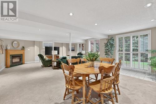 801 Surin Court, Newmarket, ON - Indoor Photo Showing Dining Room With Fireplace