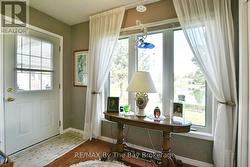 Living Area , Views of the Pond and Door to Porch - 