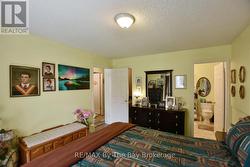 Primary Bedroom with Ensuite and Walk-In Closet - 