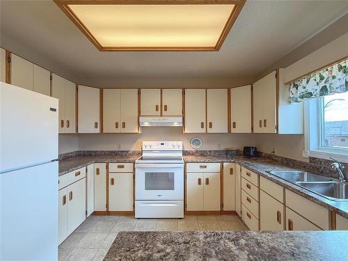 151 Daly Crescent, Brandon, MB - Indoor Photo Showing Kitchen With Double Sink