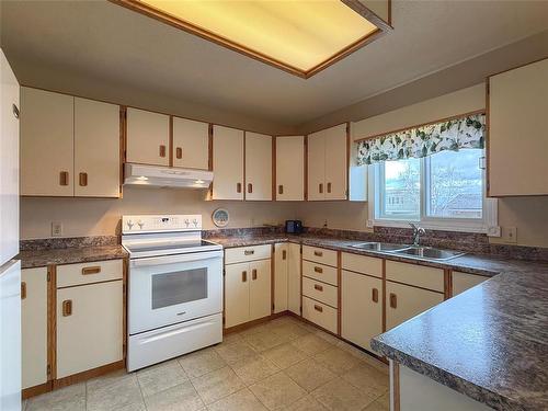 151 Daly Crescent, Brandon, MB - Indoor Photo Showing Kitchen With Double Sink