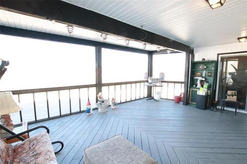 Screened in porch - 156 Cottage Road, Steep Rock, MB - Indoor Photo Showing Other Room
