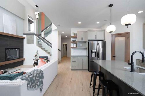 153 Gardner Trail, West St Paul, MB - Indoor Photo Showing Kitchen With Fireplace With Upgraded Kitchen