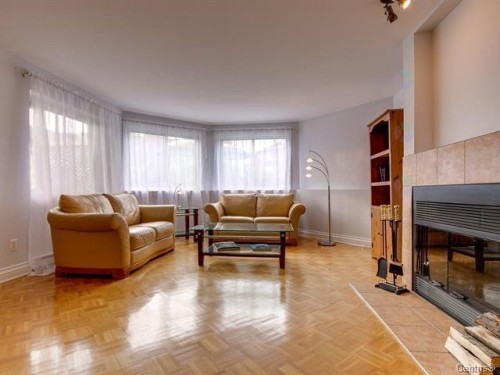 Salon - S102-1511 Boul. Shevchenko, Montréal (Lasalle), QC - Indoor Photo Showing Living Room With Fireplace