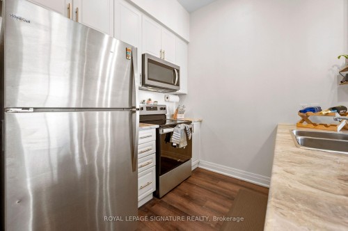 630-16 Concord Place, Grimsby, ON - Indoor Photo Showing Kitchen With Double Sink