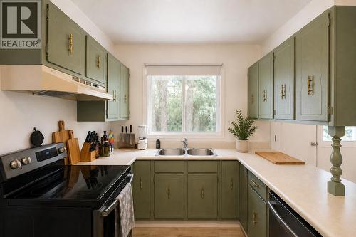 AI Enhanced - 2897 Highway 3A, Nelson, BC - Indoor Photo Showing Kitchen With Double Sink