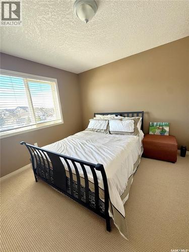 17 Eagle View Way, Elk Ridge, SK - Indoor Photo Showing Bedroom
