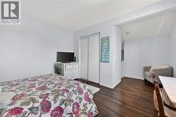 Hardwood-finish flooring throughout the room - 