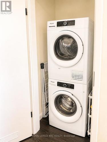 Laundry closet located just off the kitchen. - 604 - 118 West Street, Port Colborne (Sugarloaf), ON - Indoor Photo Showing Laundry Room
